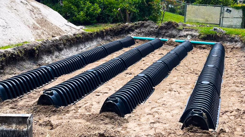 A newly laid septic drain field before backfilling