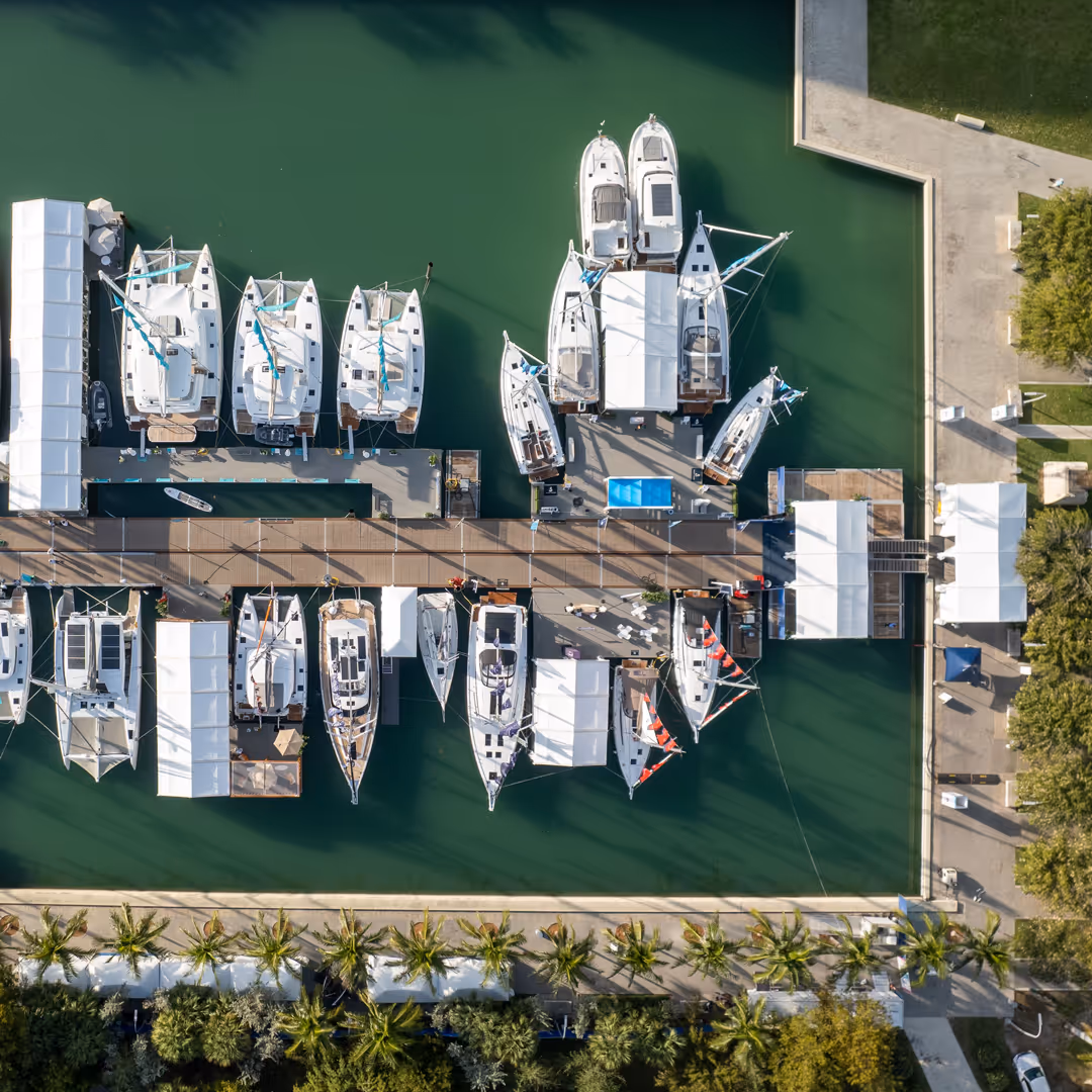 Boats moored in a Miami marina at dusk